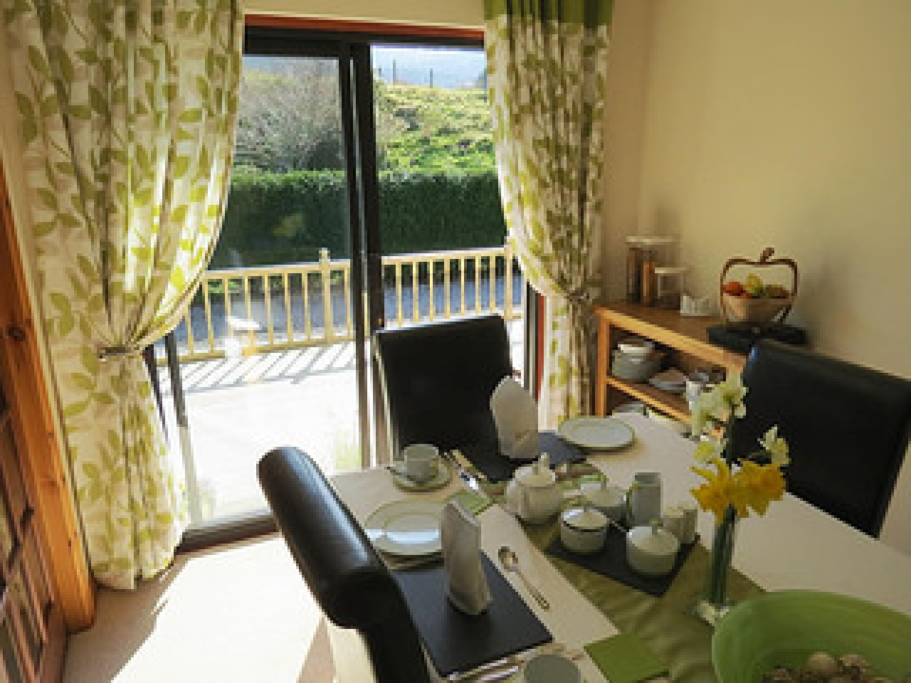 Breakfast room overlooking patio with views to Ben Nevis